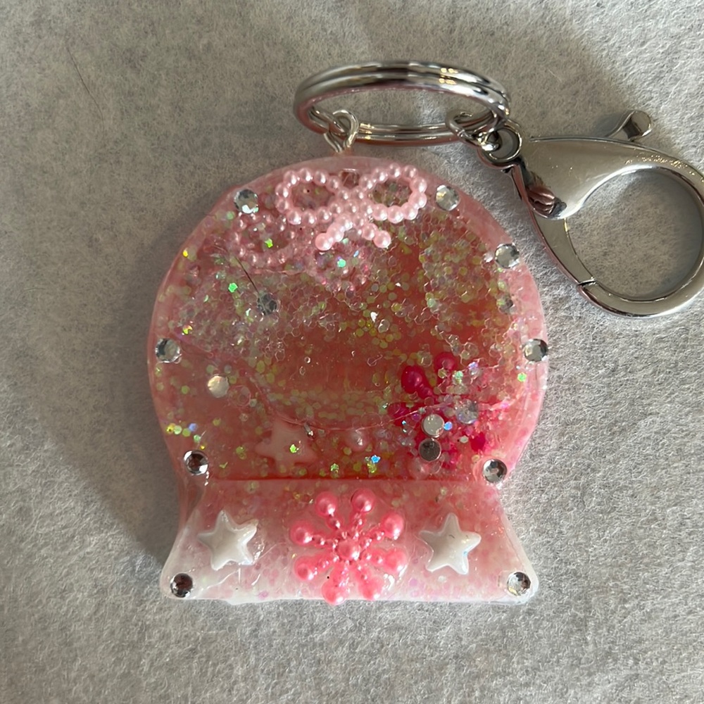 Pink snow globe shaker keychains